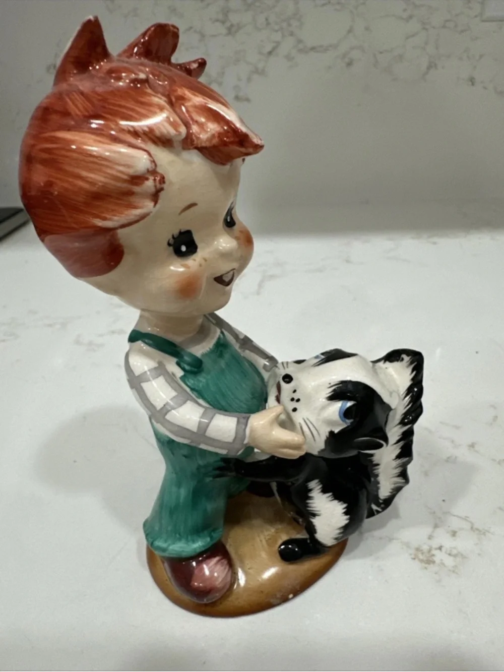 Red Headed Freckled Boy with Skunk Vintage Figurine Made in Japan